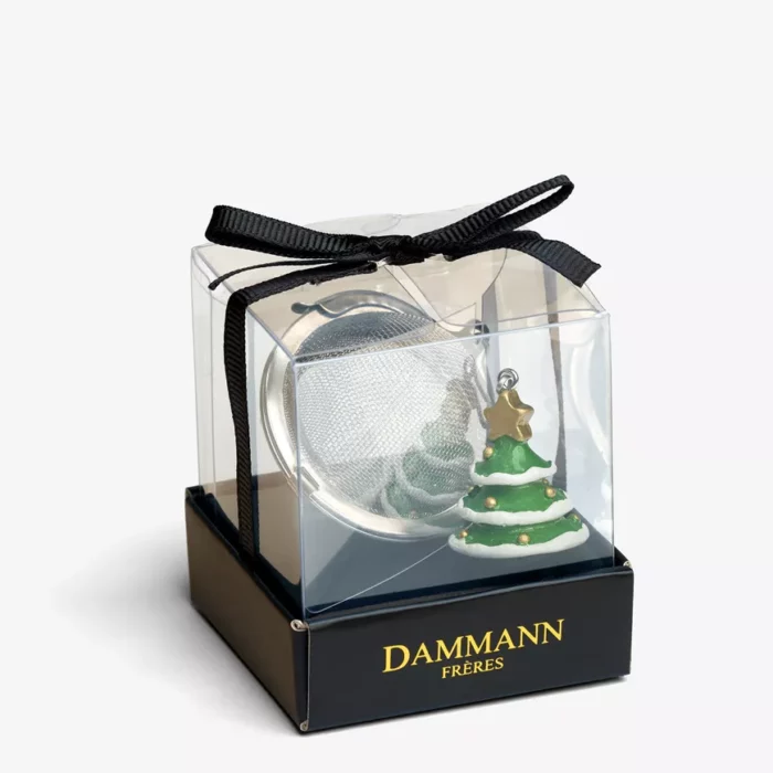 Sapin de Noël, boule à thé dans la boite